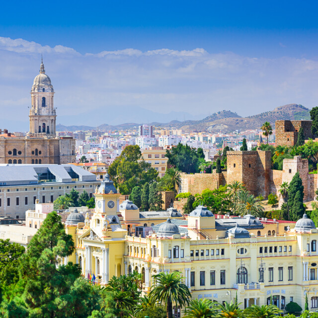 Malaga, Spain cityscape at the Cathedral, City Hall and Alcazaba citadel of Malaga.