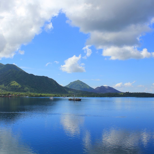 The view of Mount Tavurvur looking across Blanche Bay from Rabaul.