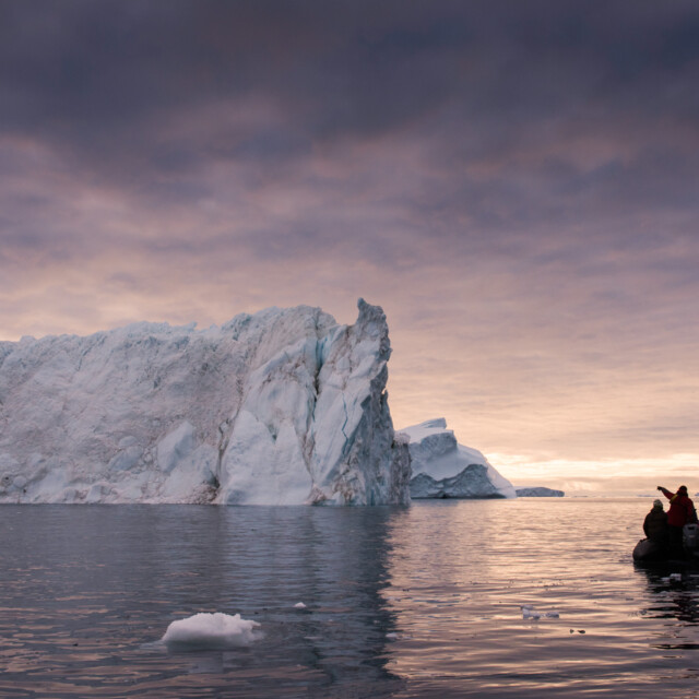 Zodiac cruise by iceberg